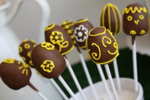 chocolate with yellow filigree cake pops